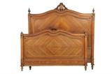 LOT 295: A FRENCH LOUIS XVI STYLE BED 