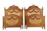 LOT 309: A PAIR OF FRENCH LOUIS XVI STYLE BEDS