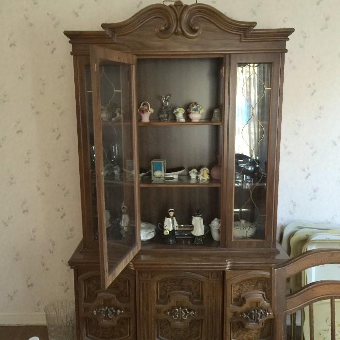 China cabinet with antique Murano and others.