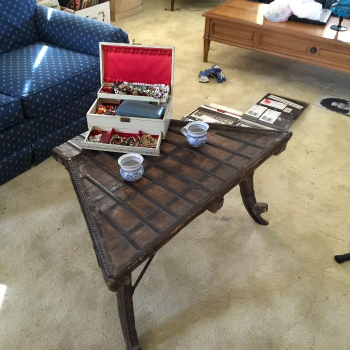 1800's repurposed ox cart now coffee table.