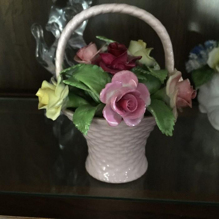 Signed vase of flowers.