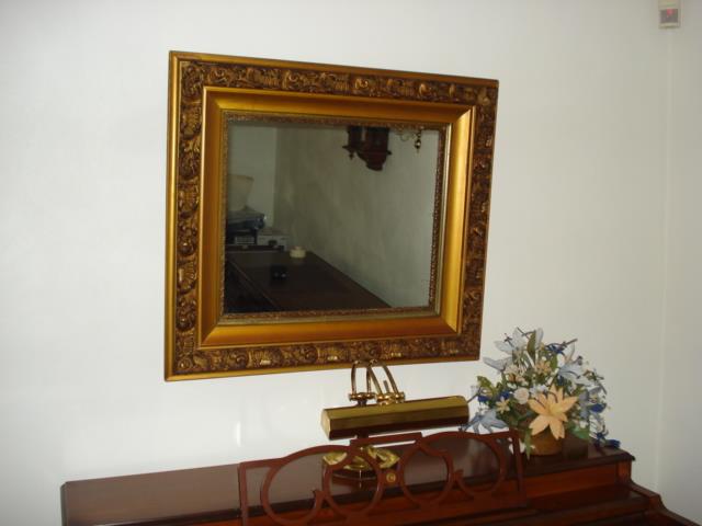 One of the many antique mirrors