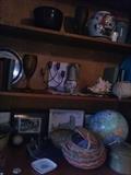 In den, assortment of baskets and hand thrown ceramics.. some signed.