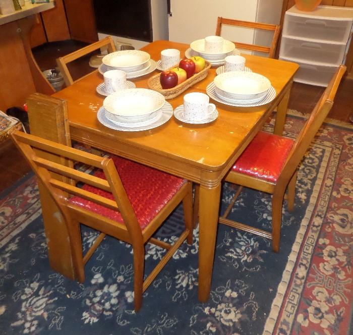 Maple Table With Three Leaves and Four Chairs