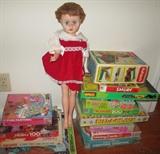 Vintage board games, doll