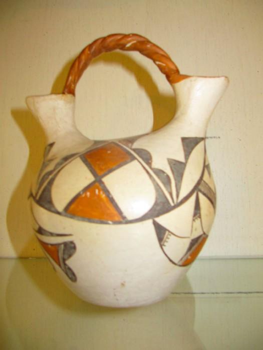 Acoma wedding basket purchased in 1947.. Handle has been repaired. 