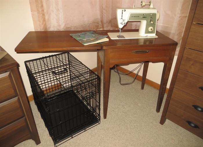 Singer sewing machine and cabinet. Dog crate