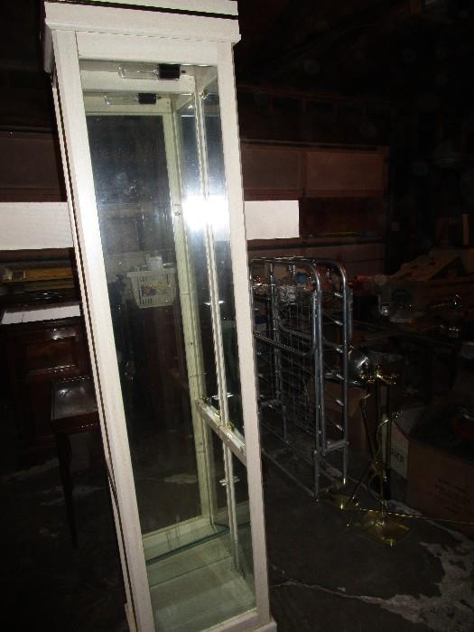 Curio cabinet with glass shelves. Perfect condition.