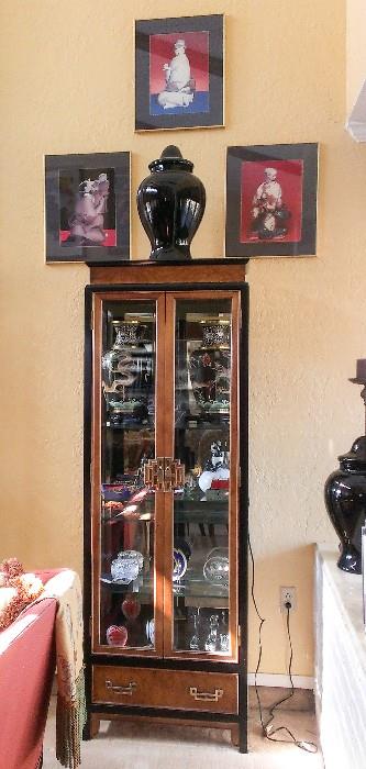 Asian-inspired curio, Asian artwork and black glass urns (2 available). Most of the curio contents is also for sale.
