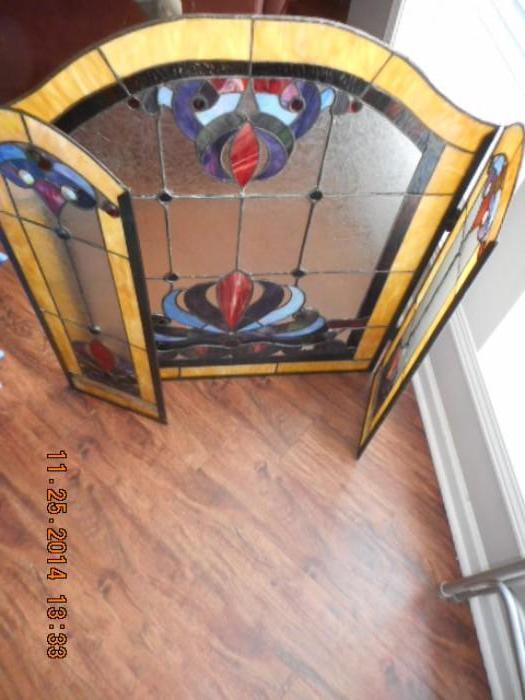 Stained glass fireplace front