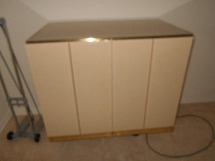 TV lift cabinet in closed position