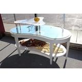 White display table with mirrored top, lower level shelf, and clear Plexiglas stand sitting on top