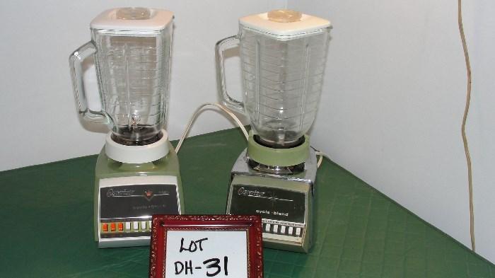 Two Osterizer Blenders 