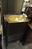 Brass and walnut sink