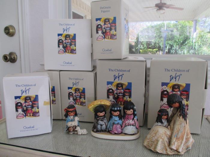 A large collection of Goebel De Grazia Figurines The Children of DeGrazia inspired by artist Ted DeGrazia