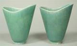 Lot 19:  Pr Swedish RORSTRAND Vases by CARL HARRY STALHANE. Matched pair of turquoise glazed vessels. Asymmetrical form. Marked: Dimensions:  H: 6 inches: W: 5 inches: D: 4.25 inches --- US Shipping charge: $35