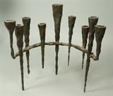 Lot 46:  Heavy Iron DAVID PALUMBO Brutalist Sculptural Menorah. Brutalist Spiked Design. David Palumbo is an Israeli Artist Sculptor. Unmarked: Dimensions:  H: 14.25 inches: W: 14 inches: D: 10.5 inches --- US Shipping charge: $35