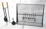 Lot 72:  GEORGE NELSON Black Iron 4pc Fireplace Set. Wood Handles. Fire Screen, Tools, Fire Starter & Log Rack.   Marked.: Dimensions:  H: 34 inches: W: 10 inches --- 