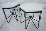 Lot 87:  Pr Jean Royere Style Black Iron Base White Composite Side Tables. Hexagonal White Tops on decorative iron rod base. : Dimensions:  H: 19.258 inches: W: 18 inches --- 