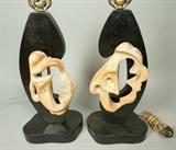 Lot 91:  Pr HEIFETZ Ebonized Table Lamps. Carved Natural Wood Elements. Black lacquer. Signed Heifetz. : Dimensions:  H: 28 inches: W: 9 inches: D: 5 inches --- 