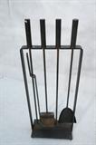 Lot 96:  PILGRIM Modernist Iron Fireplace Tools. Four tools in flat iron stand. After George Nelson. Marked USA Pilgrim Fireplace Equipment. #15.: Dimensions:  H: 32 inches: W: 12 inches: D: 6 inches --- 