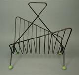 Lot 102:  Black Iron Magazine Rack. 50's Modern. Green wood ball caps. : Dimensions:  H: 18.5 inches: W: 17 inches: D: 13 inches --- US Shipping charge: $35