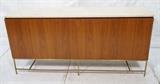 Lot 118:  PAUL McCOBB Calvin Credenza. Walnut American Modern with Marble Top. Two Trifold Doors reveal eight interior drawers. Thin brass square rod stretchers. Not marked.: Dimensions:  H: 34 inches: W: 71 inches: D: 19 inches --- 