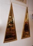 Lot 140:  Pr Gilt Wood Narrow Triangle Wall Mirrors. Beveled frame.: Dimensions:  H: 53 inches: W: 19 inches: D: 2.5 inches --- 
