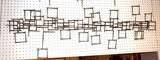 Lot 146:  Brutalist Nail Wall Art. Soldered Nails in open square patterns. : Dimensions:  H: 17 inches: W: 57 inches --- 