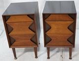 Lot 149:  Pr Modernist Night Stands. GROSFELD HOUSE. Three Drawers with contrasting color shaped fronts. Peg legs. Marked. : Dimensions:  H: 30 inches: W: 17 inches: D: 19 inches --- 