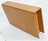 Lot 156:  Danish Teak Drop Side Dining Table. Swing out legs. Each drop is 26" long. Table is 59.75" extended. Metal joints on legs.: Dimensions:  H: 28.5 inches: W: 10 inches: D: 43.25 inches --- 