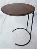 Lot 160:  JENS RISOM Round Wood Side Table. Black Iron Hairpin Base. American Modern. Sticker: Dimensions:  H: 21 inches: W: 14 inches --- 