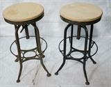 Lot 172:  Pr Industrial Antique Metal Stools. Toledo Label. Swivel seats with replaced wood tops. Adjustable height: Dimensions:  H: 29 inches: W: 15.5 inches --- 
