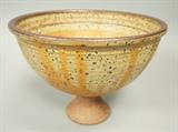 Lot 177:  RAYMOND GALLUCCI Ceramic Footed Compote Bowl. Oatmeal speckled glaze with natural clay foot. Signed.: Dimensions:  H: 7.25 inches: W: 9.5 inches --- 