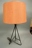 Lot 213:  50's Modern Black Iron Hairpin Table Lamp. Jean Royere style. Angled Tripod Form. Vintage shade: Dimensions:  H: 29 inches --- 