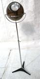 Lot 221:  Smoked Glass Ball & Chrome Floor Lamp. Tripod base.: Dimensions:  H: 47.5 inches: W: 14 inches --- 