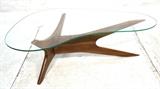 Lot 241:  ADRIAN PEARSALL Glass Top Coffee Cocktail Table. American Modern Walnut. Kidney shaped glass top.: Dimensions:  H: 15.5 inches: W: 50 inches: D: 32 inches --- 