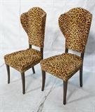 Lot 243:  Pr Tall Back Contemporary Leopard Print Lounge Chairs. Wood Legs. Tommi Parzinger style. Contemporary Wing Chairs: Dimensions:  H: 46 inches: W: 20 inches: D: 24 inches --- 