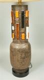 Lot 244:  Tall Pottery Table Lamp. Aldo Londi for Bitossi.  Brown Ceramic Vessel with raised detail with colored high gloss glaze. Possibly Italian. Height of pottery piece only: 22": Dimensions:  H: 39 inches --- 