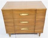 Lot 250:  WIDDICOMB Modernist 3 Drawer Bachelors Chest Low Dresser. Three Drawers with recessed brass pulls. Shaped fronts. Brass foot caps. : Dimensions:  H: 32.25 inches: W: 36 inches: D: 21 inches --- 