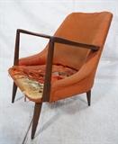 Lot 270:  Modern Lounge Arm Chair. KOFODS LARSEN style. Open wood arms and tapered peg legs. : Dimensions:  H: 32.5 inches: W: 25 inches: D: 30 inches --- 