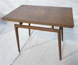Lot 287:  ROBSJOHN GIBBINGS Style American Modern Walnut Table. Cantilevered Top on Tapered legs. Not Marked. : Dimensions:  H: 22 inches: W: 28 inches: D: 18 inches --- 