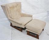 Lot 289:  ADRIAN PEARSALL Style Lounge Chair & Ottoman. Tall wing back style chair. Walnut angled leg frames. Oatmeal fabric upholstery. : Dimensions:  H: 37 inches: W: 34 inches: D: 38 inches --- 
