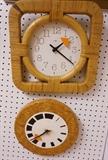 Lot 301:  Two HOWARD MILLER Wall Clocks. Both signed. 1 rattan and 1 cork.: Dimensions:  H: 17 inches --- US Shipping charge: $35
