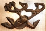 Lot 327:  FREDERICK WEINBERG Light Up Wall Sculpture. Female & Male Dancing Figures.  Textured red clay painted black. This lights up: Dimensions:  H: 28 inches: W: 41 inches --- 