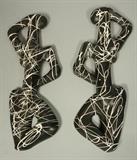 Lot 328:  Pr FREDERICK WEINBERG Mini Wall Sculptures. Black with white sgraffito drip paint details on red Clay bodies. : Dimensions:  H: 15.5 inches: W: 6 inches --- 