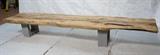 Lot 359:  11'4" Free Form Wood Slab Museum Bench. 3.75" Thick Box Elder Slab with natural free form edge on both sides. Thick concrete block supports. : Dimensions:  H: 19.5 inches: D: 29 inches: L: 135.5 inches --- 