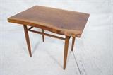 Lot 364:  GEORGE NAKASHIMA Wood Side Table. Two free form sides on wood slab top. Tapered peg legs. Customer's name on bottom: Dimensions:  H: 12.5 inches: W: 18 inches: D: 16 inches --- 