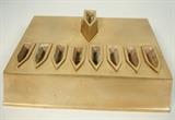 Lot 396:  ILANA GORR Solid Bronze Chanukah Menorah. Low flat menorah designed to replicate antique oil lamps. Signed. : Dimensions:  H: 4.25 inches: W: 12.25 inches: D: 9 inches --- US Shipping charge: $35