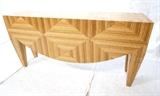 Lot 415:  Decorator Hall Console Table.  Pieced Patchwork Exotic Wood Panels. Drape front detail. Wide thick tapered legs. : Dimensions:  H: 36 inches: W: 72 inches: D: 18 inches --- 